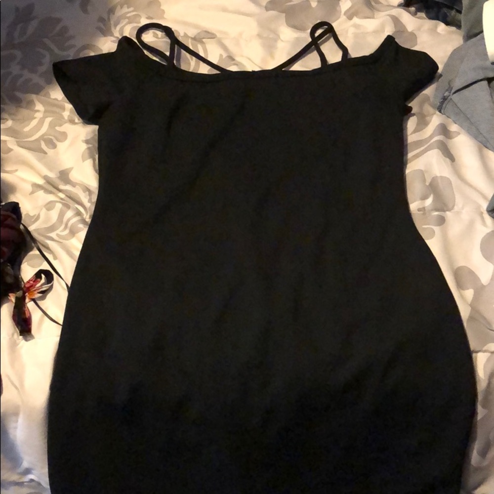 All black short dress with crossed straps